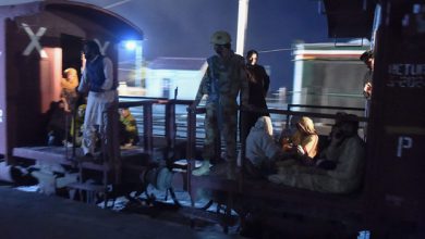 A soldier works to evacuate freed train passengers at the Mach railway station, which has been turned into a makeshift hospital, after Pakistani security forces freed nearly 80 passengers following a security operation against armed militants who ambushed the train in the remote mountainous area, in Mach, southwestern Balochistan province on March 11, 2025. Pakistani troops freed dozens of train passengers taken hostage by armed militants of the Baloch Liberation Army (BLA), a separatist group behind rising violence in the province which borders Afghanistan and Iran, after gunmen forced a train to a halt in a remote, mountainous area of Balochistan province in the afternoon of on March 11, 2025.