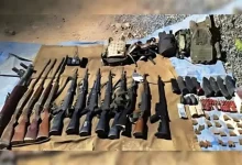 "Assam Rifles troops in Manipur after counterinsurgency operation near Indo-Myanmar border, recovering seized weapons." Weapons recovered in the operation | By special arrangement