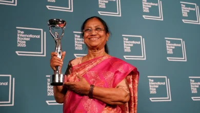 "Kannada writer Banu Mushtaq holds her International Booker Prize for 'Heart Lamp,' celebrating Indian literature's global milestone."