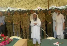 Serving members of the Pakistan Army attending the funeral - of killed terrorists - with top LeT commander Abdul Rauf.