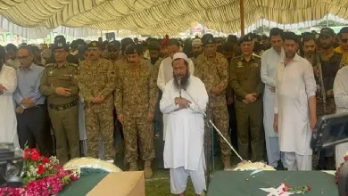 Serving members of the Pakistan Army attending the funeral - of killed terrorists - with top LeT commander Abdul Rauf.