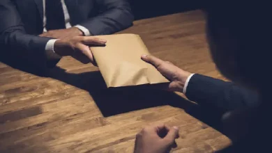 ACB arrests Industries Department officials in sand permit bribery case.
