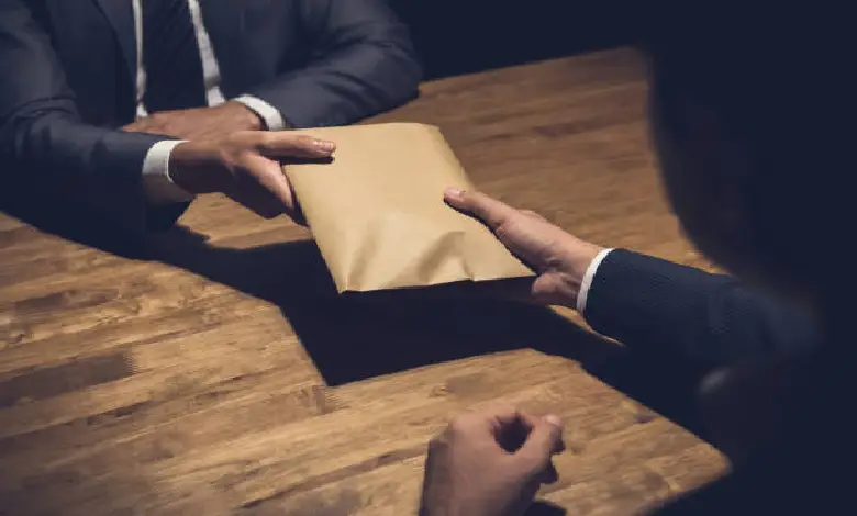 ACB arrests Industries Department officials in sand permit bribery case.