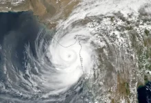 Satellite image showing a depression over the Arabian Sea approaching Gujarat, signaling heavy rainfall.