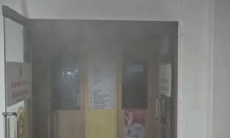 Surat Mission Hospital fire. Patients evacuated on stretchers. Firefighters battle blaze in Athwa Lines.
