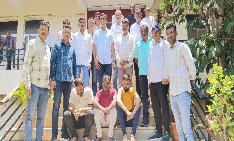 Police raid duplicate liquor factory in Jamnagar; bottles, labels, and materials seized during crackdown.
