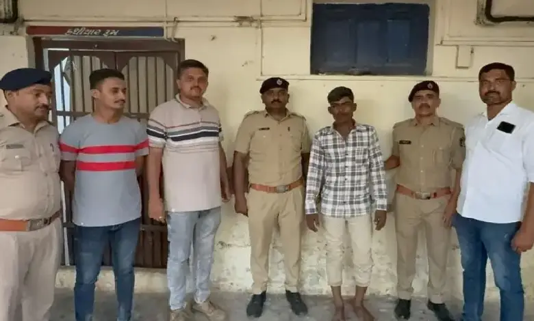 Jamnagar railway police at crime scene where disabled man was found dead after being thrown from a moving train.