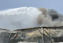 Firefighters tackle massive blaze at Welspun cotton plant in Anjar, with smoke billowing from the factory unit.
