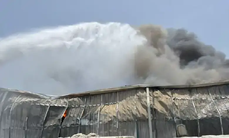 Firefighters tackle massive blaze at Welspun cotton plant in Anjar, with smoke billowing from the factory unit.