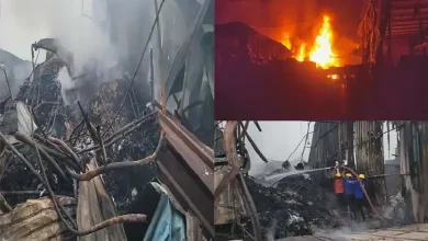 Smoke and flames rise from burning scrap godowns in Vapi’s Dungari Faliya, as fire crews battle the intense blaze.