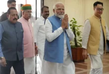 Prime Minister Narendra Modi at a press conference, reflecting on key political and national developments.