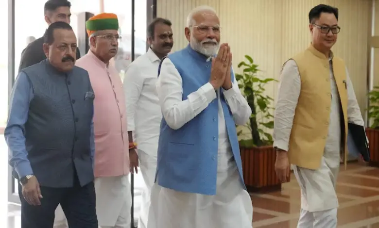 Prime Minister Narendra Modi at a press conference, reflecting on key political and national developments.