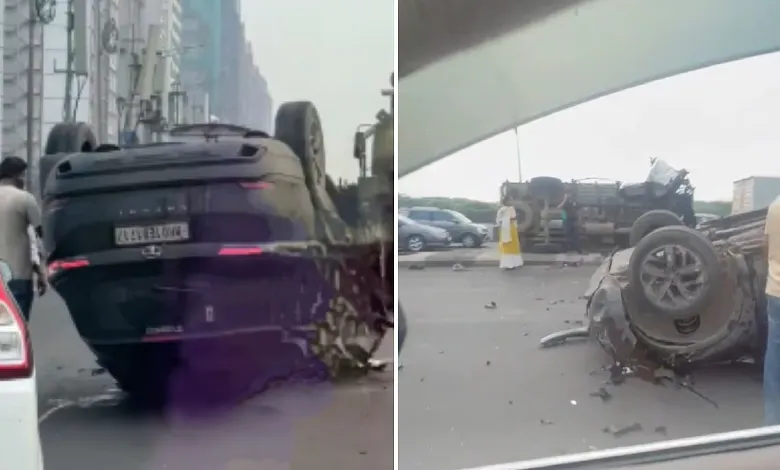 "Damaged car and tempo after collision on Mumbai's Eastern Express Highway near Vikhroli, with emergency responders at scene"