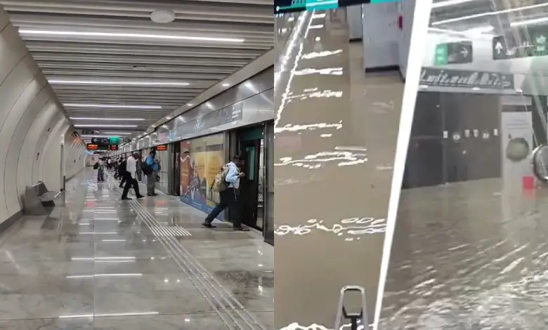 Mumbai Metro station entrance during a heavy monsoon downpour, with rain preparedness measures underway.