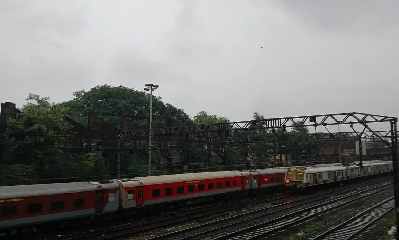 Heavy monsoon rains in Mumbai causing waterlogging, with dark clouds and lightning overhead.
