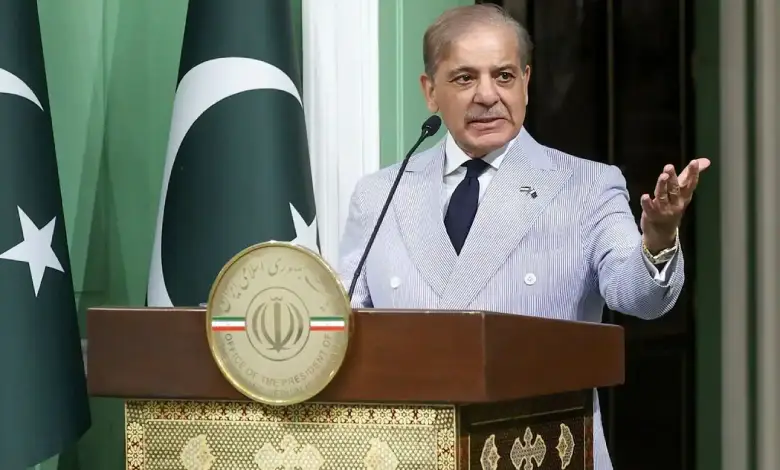 Pakistan's PM Shehbaz Sharif speaks at a press conference, discussing peace talks with India on Kashmir and trade.