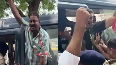 Congress rally in Rajkot demanding justice for TRP fire victims, with heavy police presence and public protest.