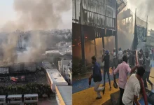 Grieving family members hold photos of loved ones lost in the Rajkot gaming zone fire.
