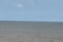 Coastguard responds to suspicious boat sighting off Jafrabad coast amid Gujarat fishing ban due to weather and security alerts.