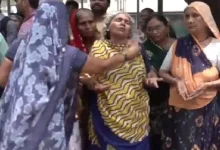 Family members mourn the deaths of three workers who drowned in a tank during night shift cleaning operation.