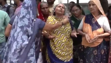 Family members mourn the deaths of three workers who drowned in a tank during night shift cleaning operation.