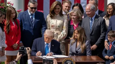 President Trump signs the "Take It Down Act" alongside First Lady Melania Trump, addressing non-consensual intimate content.