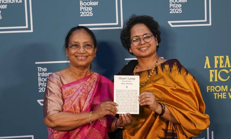 "Kannada writer Banu Mushtaq holds her International Booker Prize for 'Heart Lamp,' celebrating Indian literature's global milestone."