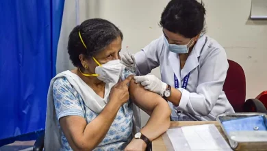 vaccine shot being administered