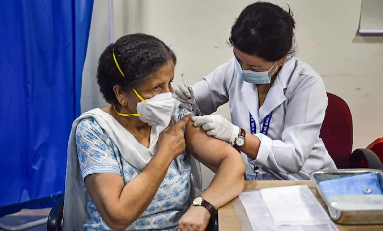 vaccine shot being administered
