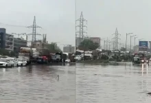 Flooded street in Ahmedabad's Nikol area blocks ambulance access, leading to a tragic fatality amid ongoing monsoon rains.