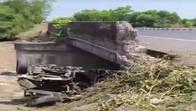 Bolero crash on Rajkot-Bhavnagar highway; car broke divider and plunged into canal, killing two, including a government engineer.