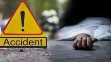Truck-bike collision on Surendranagar-Dhrangadhra highway amid rising road accident deaths in Gujarat.