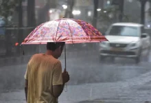 Flooded streets and heavy rainfall in Gujarat as monsoon intensifies; IMD issues alerts for multiple districts.