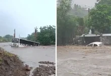 Flooded roads and stranded bus in Amreli district amid heavy monsoon rains in Gujarat, causing local disruptions.