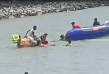 Rescue teams and locals at Dwarka’s Gomtighat after pilgrims from Jamnagar drown in Gomti River due to strong currents.