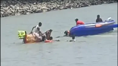 Rescue teams and locals at Dwarka’s Gomtighat after pilgrims from Jamnagar drown in Gomti River due to strong currents.