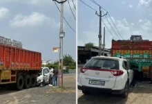 Accident site on Ahmedabad-Indore highway showing crashed car and truck near Kanbha after fatal collision involving biker.