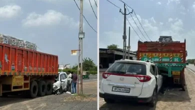 Accident site on Ahmedabad-Indore highway showing crashed car and truck near Kanbha after fatal collision involving biker.