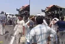 Damaged ST bus after Kapadvanj-Modasa highway accident involving truck and dumper, highlighting road safety risks.