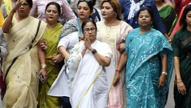 West Bengal Chief Minister Mamata Banerjee, drenched in rain, held a massive protest march in Kolkata over alleged harassment of Bengali-speaking people in BJP-ruled states.