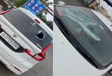Taxi driver breaks car window near CTM Express Highway during dispute over passengers; incident caught on CCTV footage.