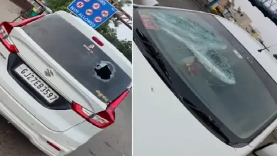 Taxi driver breaks car window near CTM Express Highway during dispute over passengers; incident caught on CCTV footage.