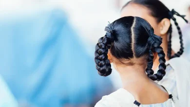 Kheda school teacher cuts student’s hair in Mahudha over uniform rule violation, prompting protests and official inquiry.