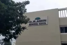 Vadodara police at DR Amin School after bomb threat e-mail; bomb squad conducts search for RDX.