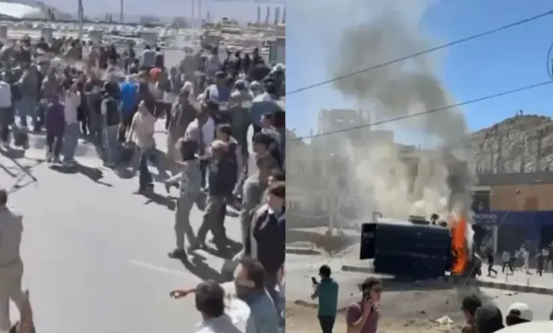 Angry protesters clashed with the police in Leh city of Ladakh this morning, pelting stones at officials and even burning down a police vehicle.