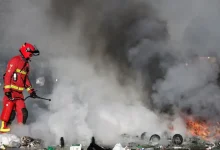 Protesters blocked roads, set blazes and were met with volleys of police tear gas on Wednesday in Paris and elsewhere in France.