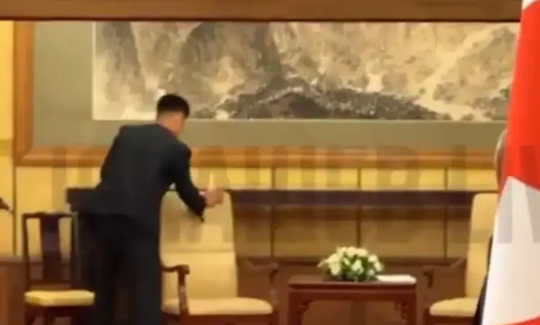 : A video has surfaced online showing North Korean staff frantically scrubbing and sanitising every object Kim Jong Un touched during his meeting with Vladimir Putin in China.