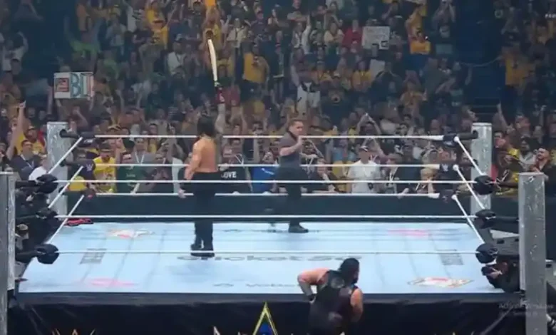 Helicopter Shot: WWE Roman Reigns Stuns Crowd by Striking Bronson Reed With Cricket Bat | Watch Video
