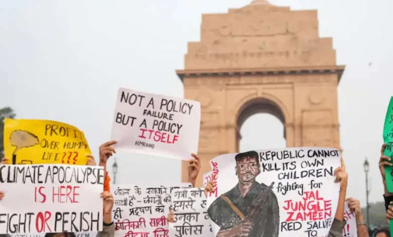 A protest over Delhi's toxic air crisis at the India Gate sparked controversy after demonstrators displayed posters of top Maoist commander Madvi Hidma.