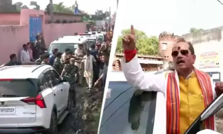 Some unidentified men threw stones, cow dung and slippers at Deputy Chief Minister Vijay Kumar Sinha's convoy in Bihar's Lakhisarai district on polling day.